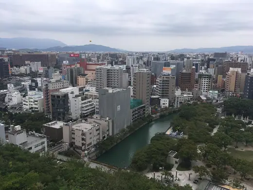 Photo 2: Exterior · View of Fukuoka from ACROS