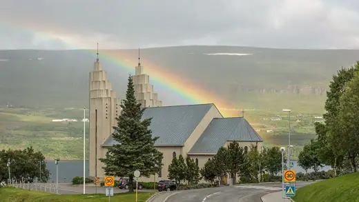 Photo 4: Exterior · church and rainbow in Akureyri