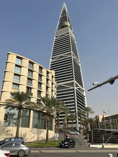 Photo 4: Exterior · Al Faisaliah Hotel (left) with the Al Faisaliah Tower in the background in Riyadh, Nov 2023