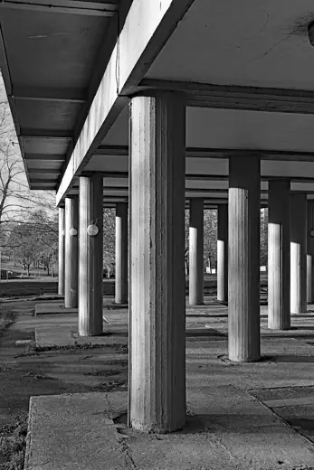Photo 4: Exterior · Architects: C.A.Lucas, W.G.Howell et al of the LCC, 1958, showing undercroft of Charcot House