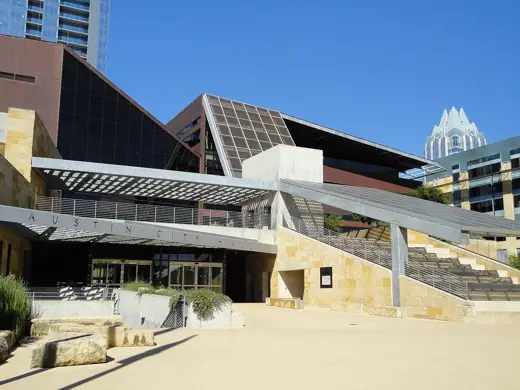 Photo 3: Interior · Front of the Austin City Hall, Frost Bank in the background; Austin, Texas