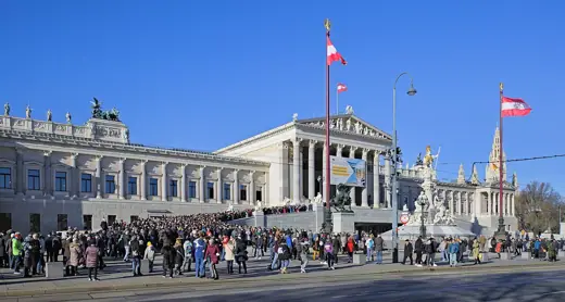 Photo 3: Exterior · The waiting line at the Austrian Parliament Building on the open day in Vienna , Austria