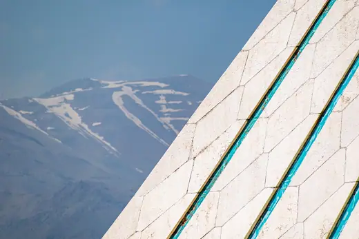 Photo 6: Detail · The Azadi Tower (detail) and the Tochal (background) in Tehran , Iran 