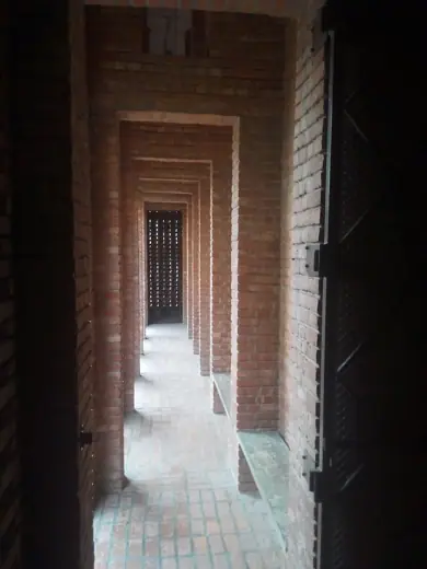 Photo 3: Interior · Bait Ur Rouf mosque corridor