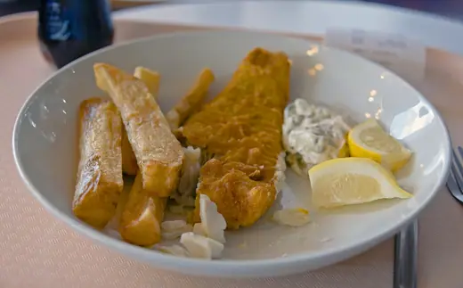 Photo 6: Interior · A plate of fish and chips at the Barbican Centre food halls