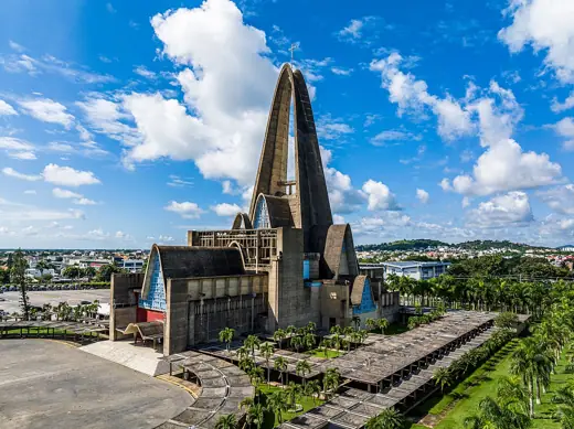 Photo 2: Exterior · Vista aérea perspectiva del ala izquierda de la Basílica en Higüey, La Altagracia, RD>