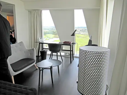 Photo 6: Interior · Poet Sofa designed by Finn Juhl in guest room at Copenhagen's Bella Sky Hotel