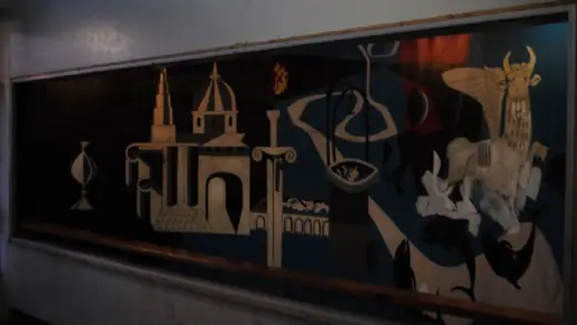 Photo 3: Exterior · Mural by Peter Yates dating from c.1954, located in entranceway to Bevin Court