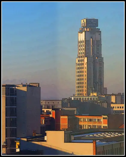 Photo 2: Exterior · 1920's Skyscraper in Bright Sun