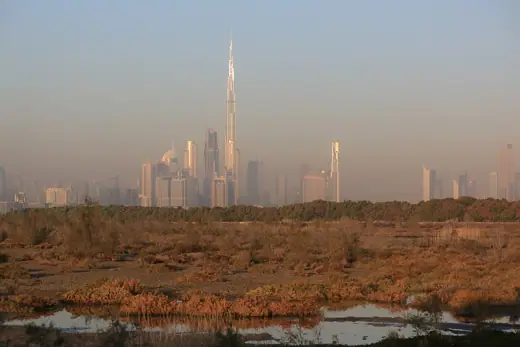 Photo 2: Exterior · Dubai Burj Khalifa Sunrise hitting the Burj Khalifa