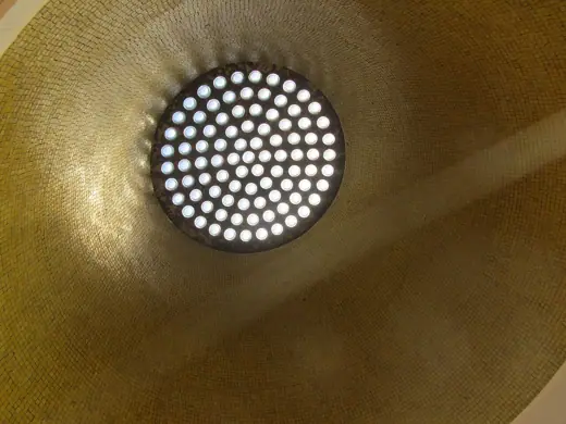Photo 5: Interior · A dome skylight inside Busáras in Dublin with mosaic tiles surrounding