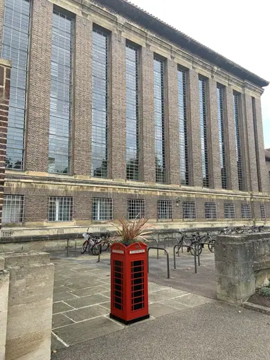 Photo 4: Model · A planter in the form of a K6 red phone box, outside the main entrance to the University Library, Cambridge