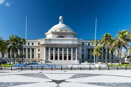 Photo 1: Exterior · Front (north) façade of Capitol of Puerto Rico overlooking the North Atlantic Ocean