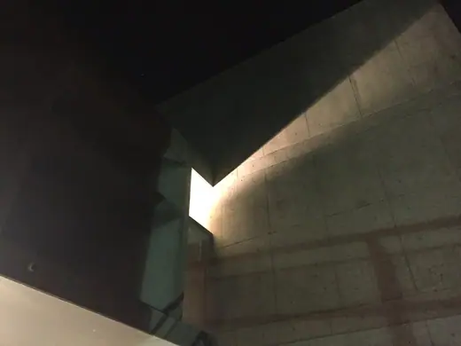 Photo 5: Interior · A window in the Carpenter Center lit from inside at night