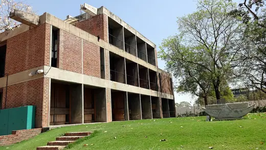 Photo 2: Exterior · A building from cept university