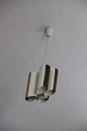 Photo 5: Interior · One of the lighting fixtures of the Church of the three crosses in Imatra