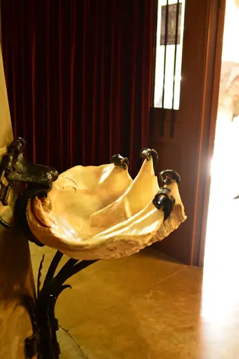 Photo 6: Interior · Holy water font, Crypt of Colònia Güell