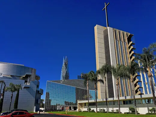 Photo 3: Exterior · The Crystal Cathedral complex with buildings from Philip Johnson, Richard Meier and Richard Neutra