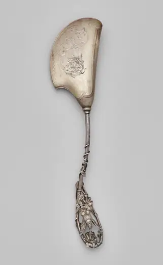 Photo 4: Exterior · A sterling silver scoop featuring a hummingbird handle made by Whiting Manufacturing Co