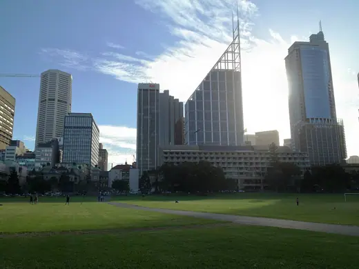 Photo 2: Exterior · View of the Deutsche Bank building from The Domain park in Sydney, Australia