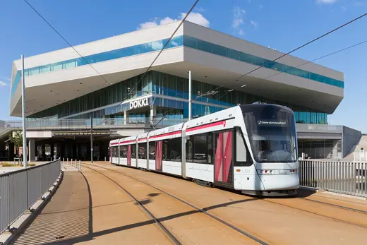Photo 4: Exterior · Tram unit 1201 as Line 2 approaching Dokk1, Aarhus