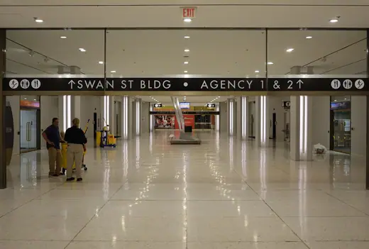 Photo 2: Interior · The hallway providing access to Agency Buildings 1 & 2 and Swan St