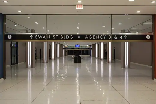 Photo 3: Interior · The hallway providing access to Agency Buildings 3 & 4 and Swan St