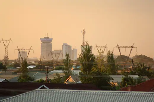 Photo 2: Exterior · Lusaka at dusk