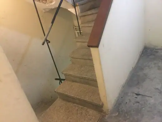 Photo 6: Interior · Back stairs to tower apartments_FOCSA Building