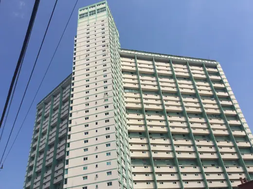 Photo 5: Exterior · Entrance elevation showing tower_FOCSA Building