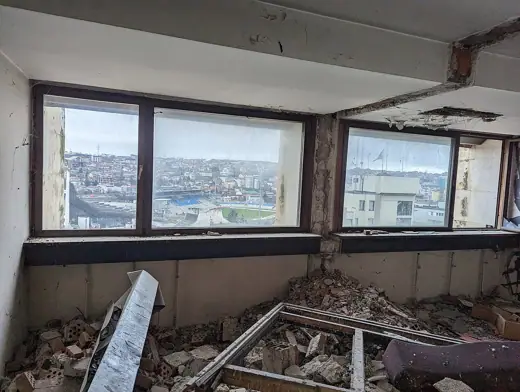 Photo 5: Interior · Abandoned hotel room