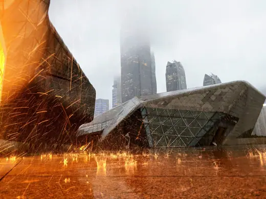 Photo 6: Detail · Rainfall hitting the ground next to the w:Guangzhou Opera House , illuminated by the LED-display sign