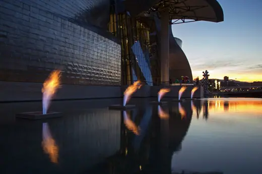 Photo 8: Context · Dusk at Bilbao, from the esplanade at the entrance to the Guggenheim Museum