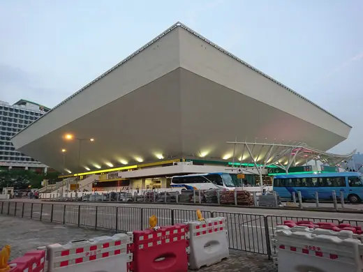 Photo 3: Exterior · Hong Kong Coliseum in the evening