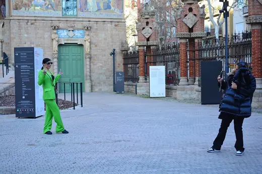 Photo 5: Interior · Woman posing just inside the entrance to the Hospital de la Santa Creu i Sant Pau, Barcelona