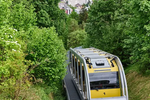Photo 5: Context · Funicular Hungerburgbahn in Innsbruck seen from Hermann-Buhl Platz in Innsbruck-Mühlau