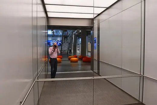 Photo 5: Interior · The elevator is huge, with a mirror at its end increasing the feeling of travelling in a large room