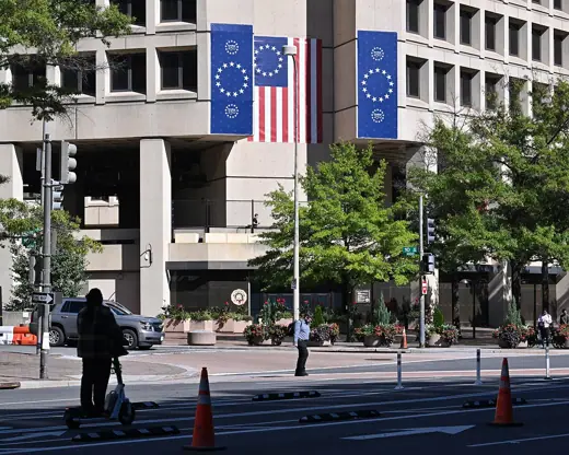 Photo 5: Exterior · Looking across Pennsylvania Ave and 10th St NW at the corner of the J