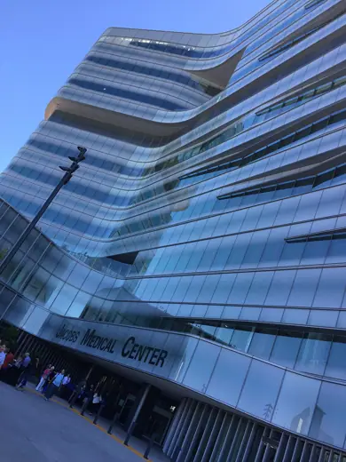 Photo 3: Exterior · The main entrance to the Jacobs Medical Center hospital at the University of California, San Diego