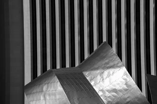Photo 6: Detail · Aon Centre in background and Jay Pritzker Pavillion in foreground-Millennium Park, Chicago