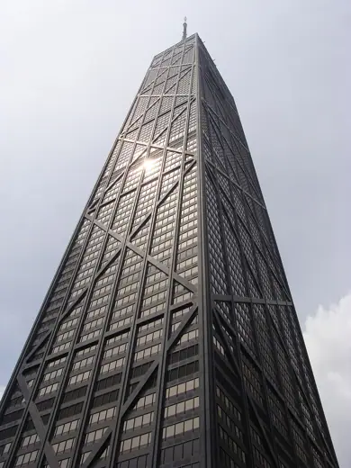 Photo 3: Exterior · Sunlight gleaming off the John Hancock Center in Chicago