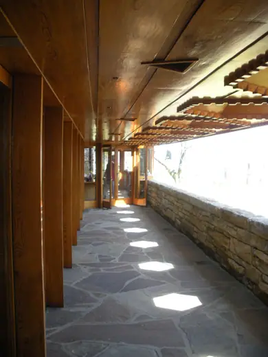 Photo 2: Exterior · Outside walkway at Kentuck Knob with hexagonal skylights