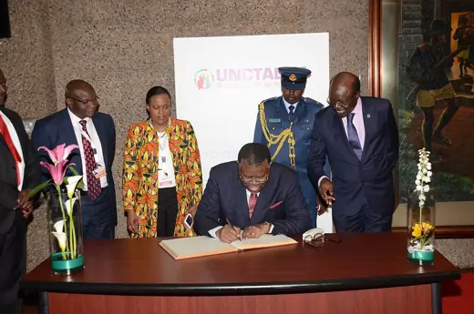 Photo 2: Exterior · (L-R) Omingo Magara, Board chairman of KICC; Nana Gecaga, Acting Managing Director of KICC; H.E