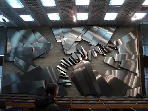 Photo 6: Interior · Stainless steel relief in the Main hall of Kockica, author Stevan Luketić