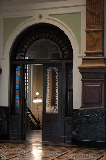 Photo 6: Interior · Fancy door and stairs in Portrait Gallery