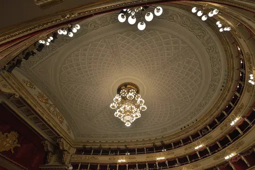 Photo 5: Interior · Ceiling and chandelier (weight 1000 Kg) in the Teatro alla Scala opera house in Milan