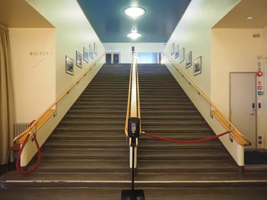 Photo 6: Interior · A view of a staircase at the Lasipalatsi building in Kamppi, Helsinki, Finland on an afternoon in March 2025