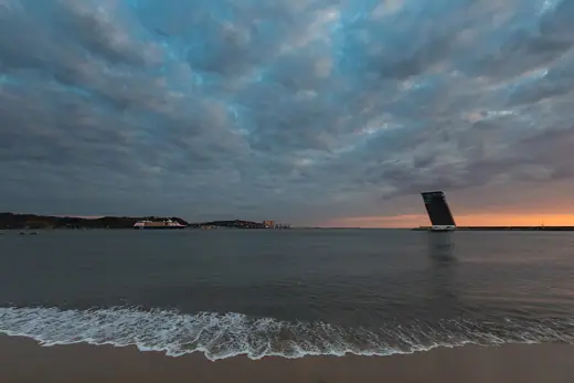 Photo 4: Exterior · Cruise ship leaving Lisbon harbour at sunset