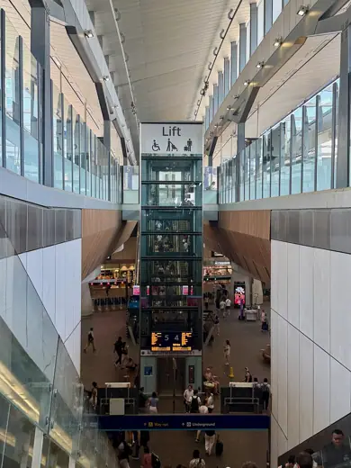 Photo 4: Exterior · London Bridge railway station with a glass lift shaft central in the image
