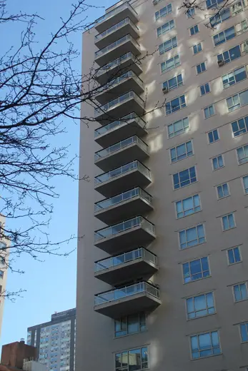 Photo 3: Exterior · The Manhattan House Apartments in Manhattan, New York, seen in February 2023